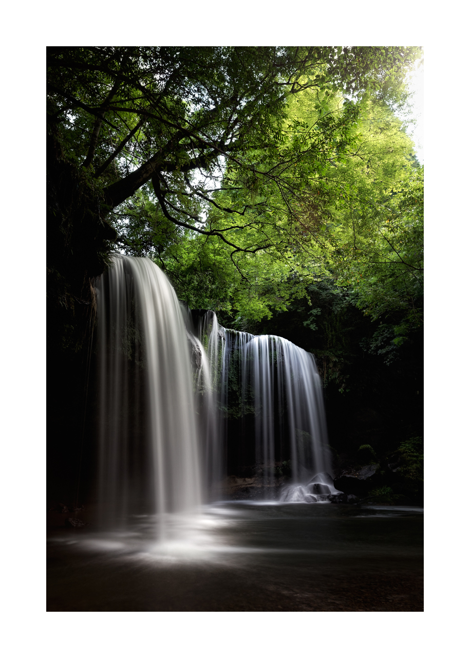 Fine art image of Nabegataki Waterfalls at Kumamoto, Japan with the silky glow effect for the water.